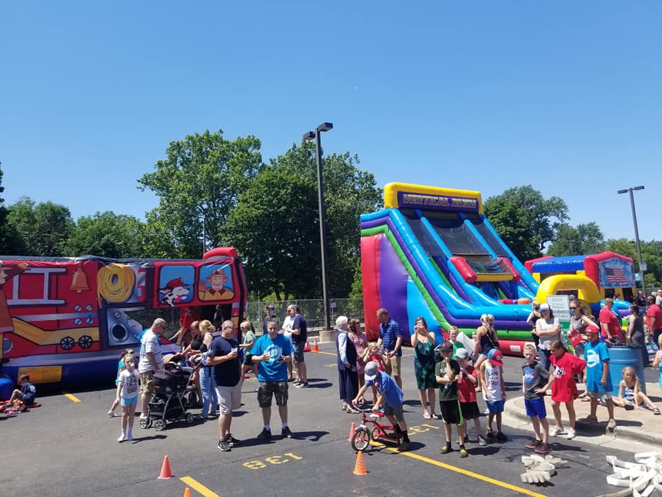 Fire truck themed bounce house rental for elementary school event
